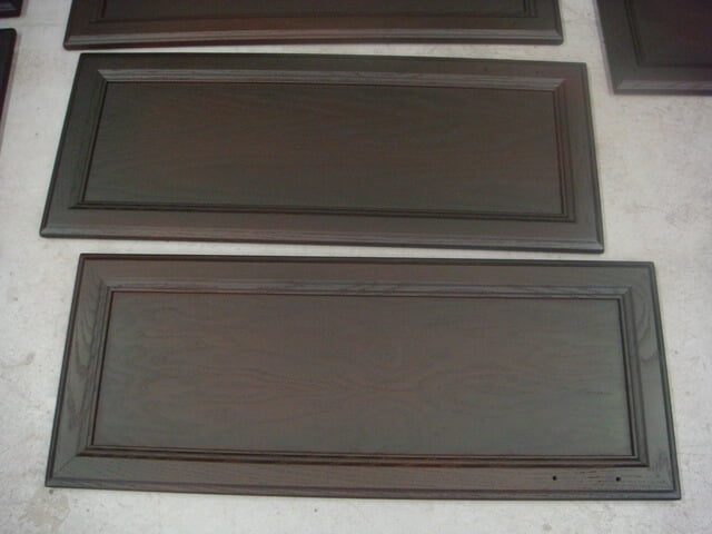 Spraying some older kitchen cabinets